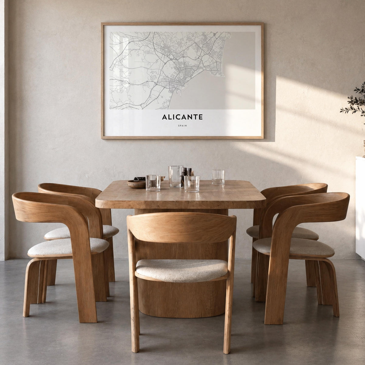 Alicante black & white map poster of Spain – horizontal wall art in natural wood frame, hanging on wall