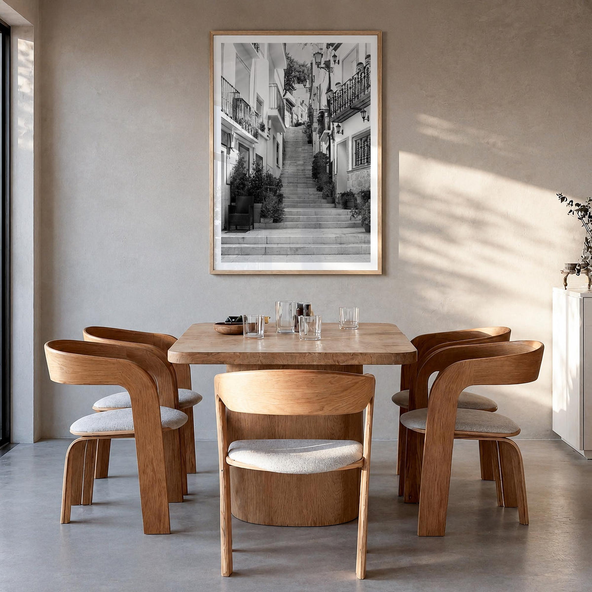Alicante no. 1 black & white photo poster of Spain – vertical wall art in natural wood frame with white border, hanging on wa