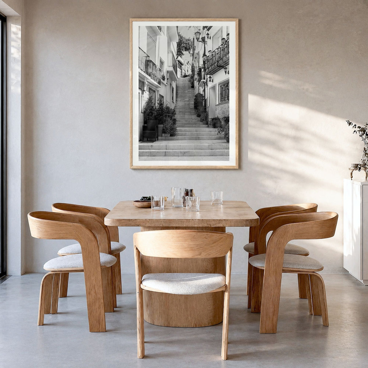 Alicante Photo No 2 Poster in a natural wood frame, hanging in a dining room, white border