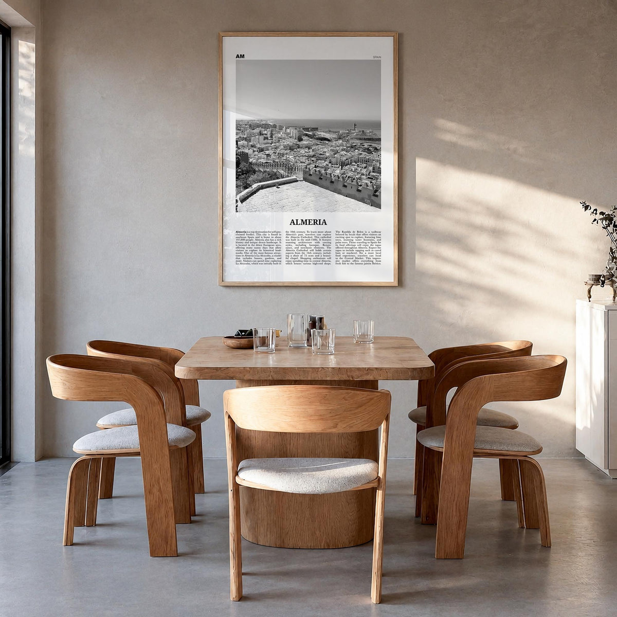 Almería black & white newspaper poster of Spain – vertical wall art in natural wood frame, hanging on wall