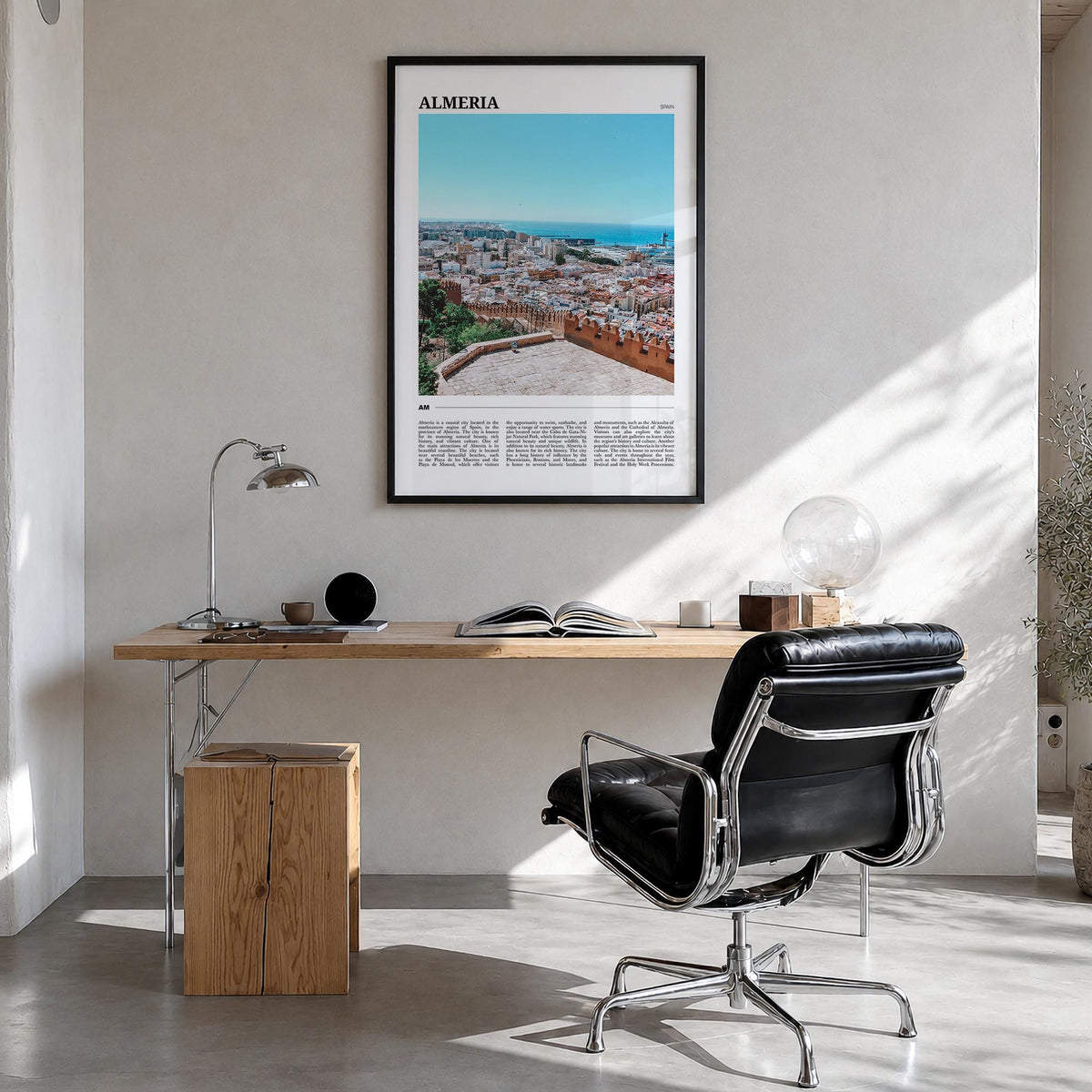 Almería colorful travel poster of Spain – vertical wall art in black wood frame, hanging on wall