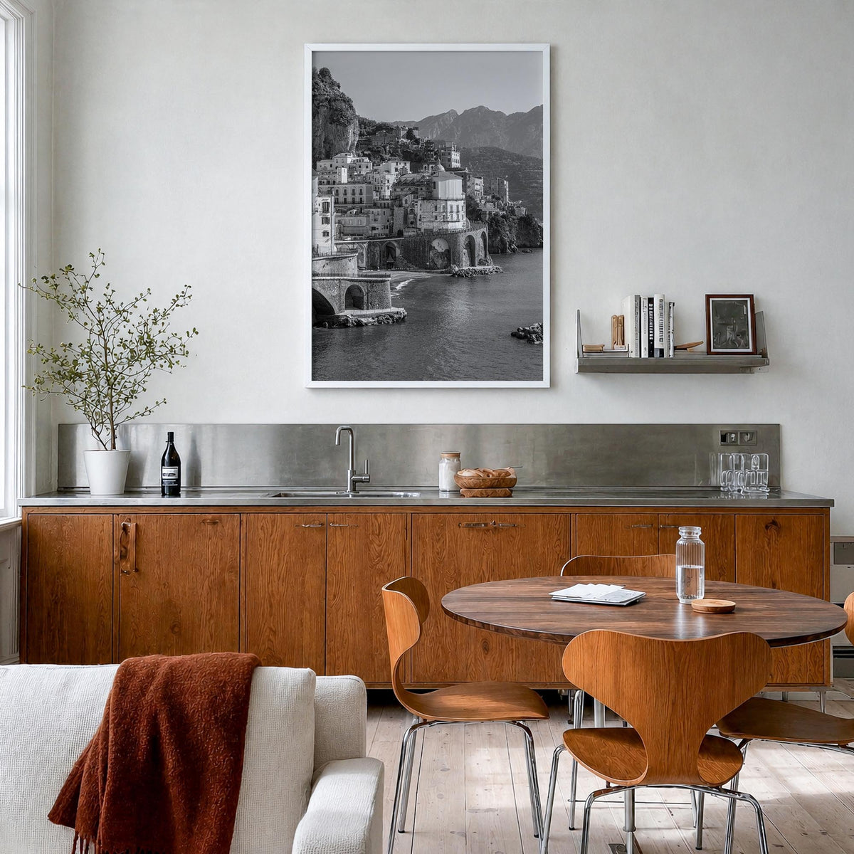 Amalfi black & white photo poster of Italy – vertical wall art in white wood frame, hanging on wall