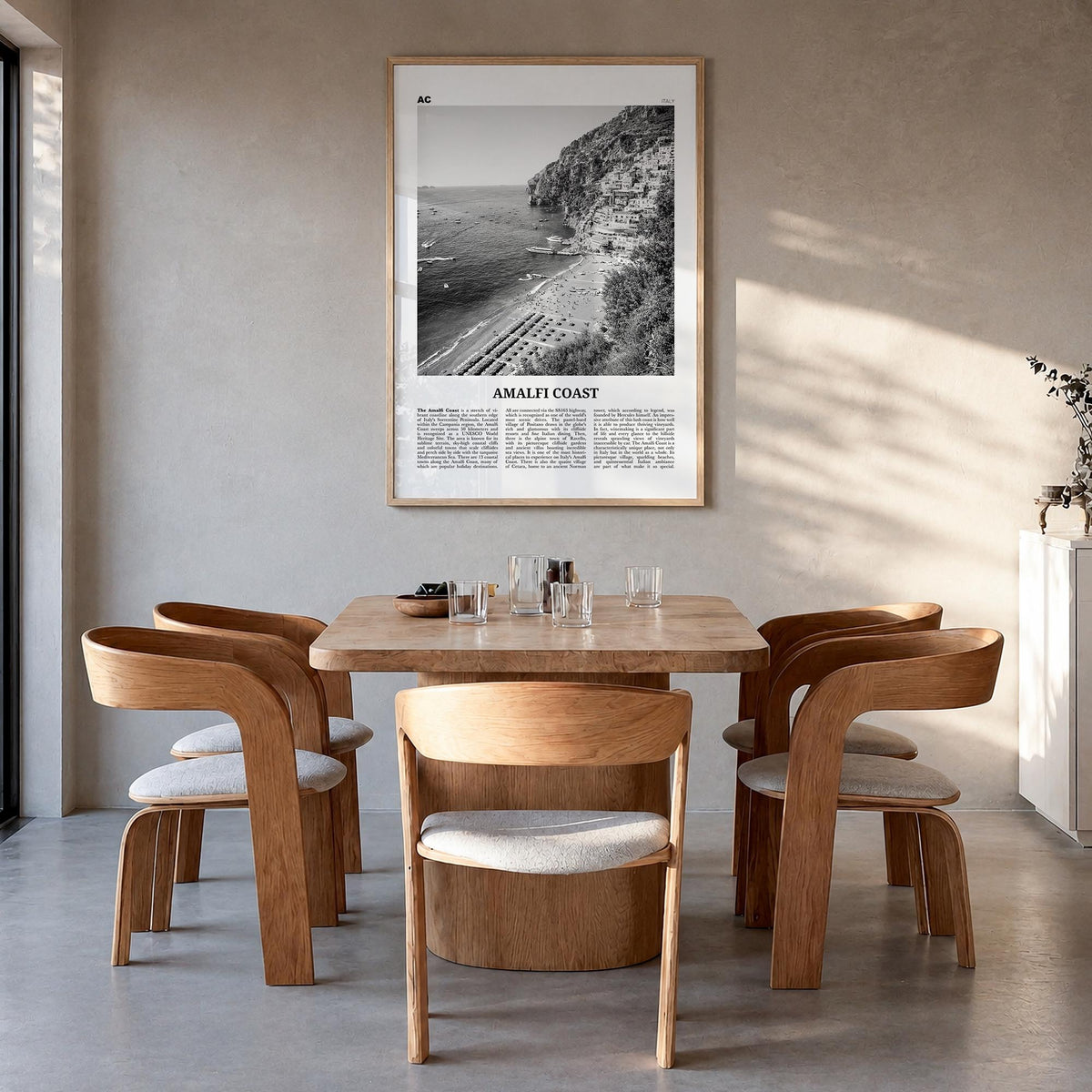Amalfi Coast black & white newspaper poster of Italy – vertical wall art in natural wood frame, hanging on wall