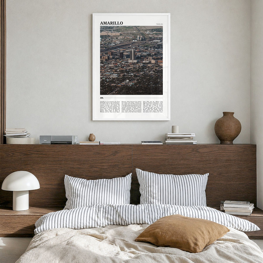 Amarillo Travel Poster in a white wood frame, hanging in a bedroom