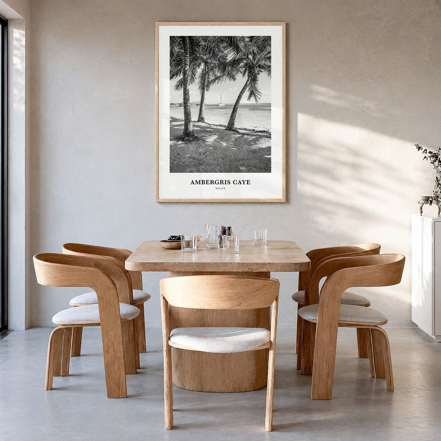 Ambergris Caye Classic Poster in a natural wood frame, hanging in a dining room