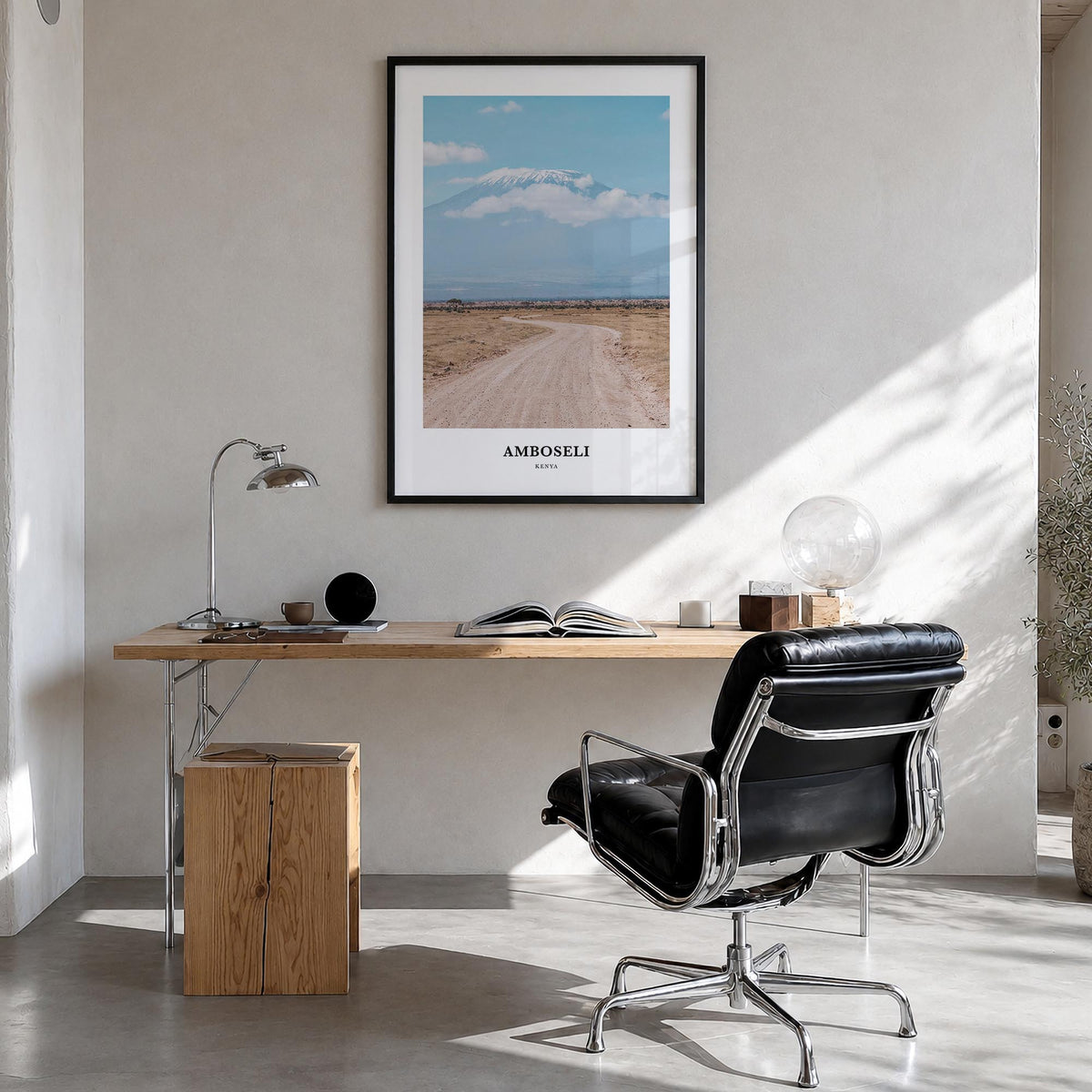 Amboseli colorful classic poster of Kenya – vertical wall art in black wood frame, hanging on wall