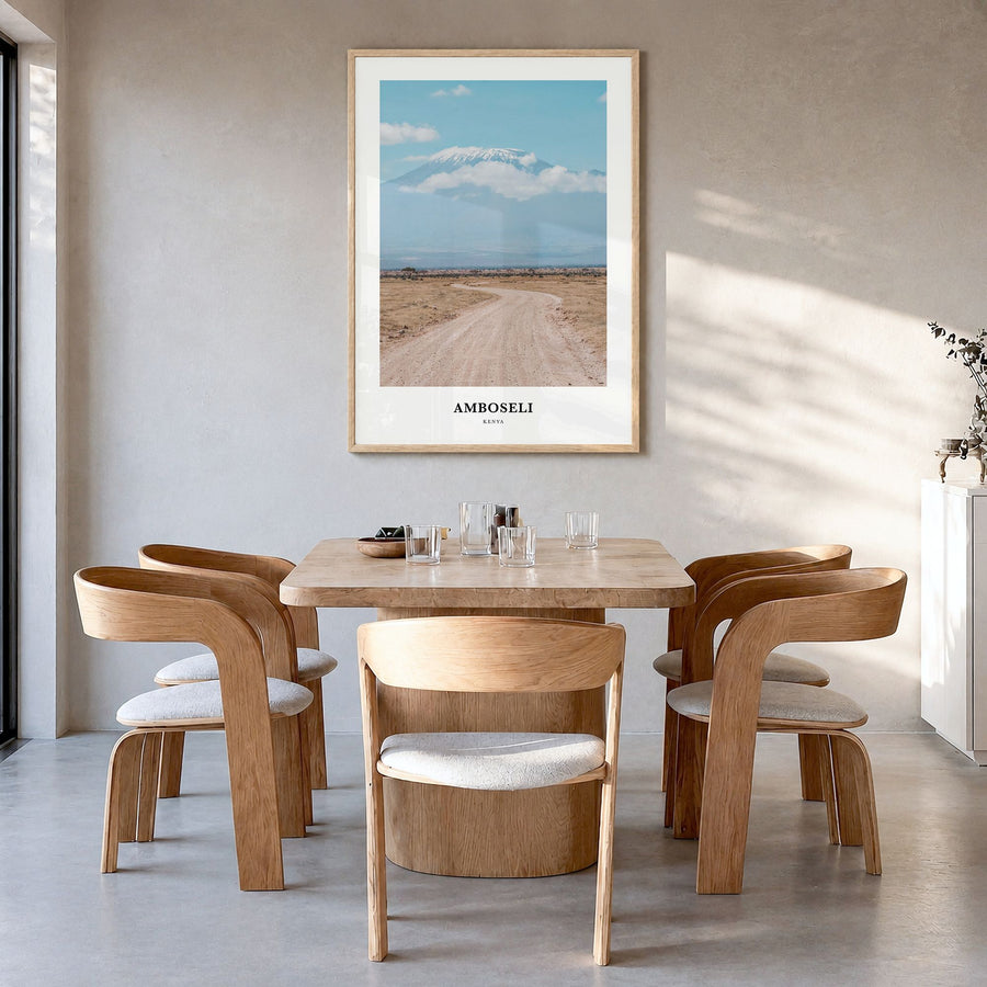 Amboseli Classic Poster in a natural wood frame, hanging in a dining room