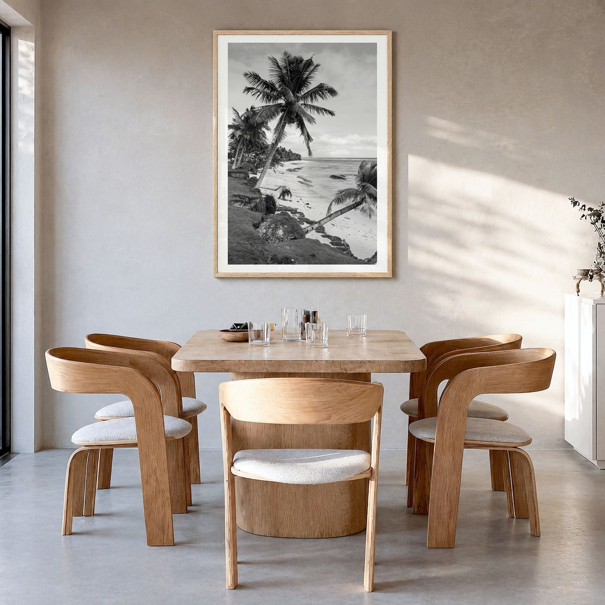 American Samoa Photo Poster in a natural wood frame, hanging in a dining room, white border