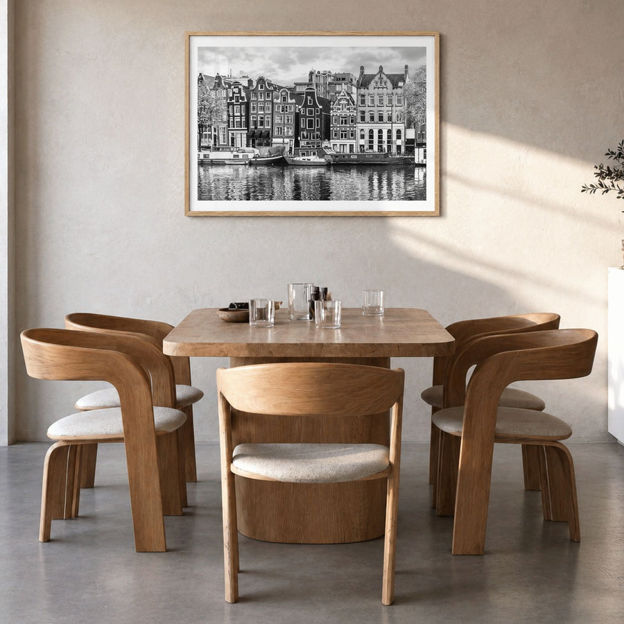 Amsterdam Photo No 2 Poster in a natural wood frame, hanging in a dining room, white border