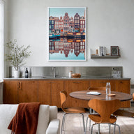 Amsterdam no. 1 colorful photo poster of Netherlands – vertical wall art in white wood frame, hanging on wall