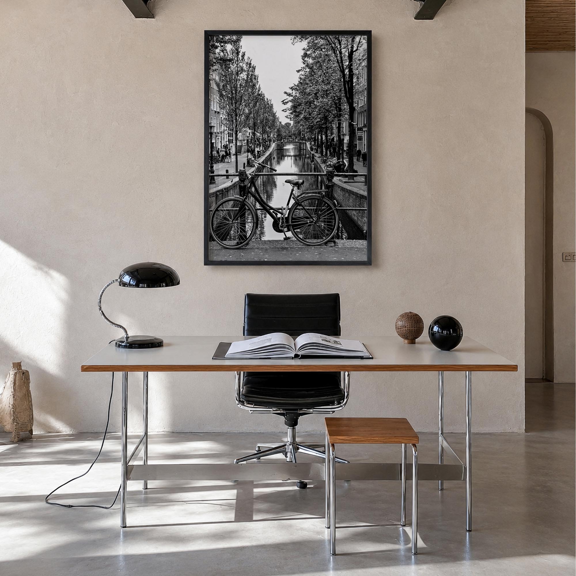 Amsterdam no. 3 black & white photo poster of Netherlands – vertical wall art in black wood frame, hanging on wall