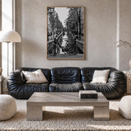 Amsterdam no. 3 black & white photo poster of Netherlands – vertical wall art in natural wood frame, hanging on wall