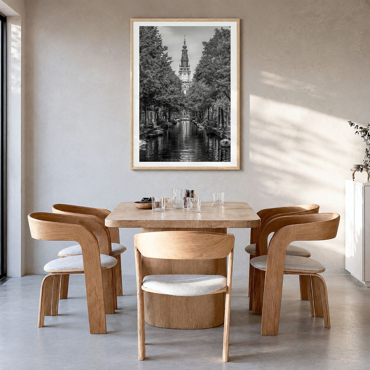 Amsterdam Photo No 1 Poster in a natural wood frame, hanging in a dining room, white border