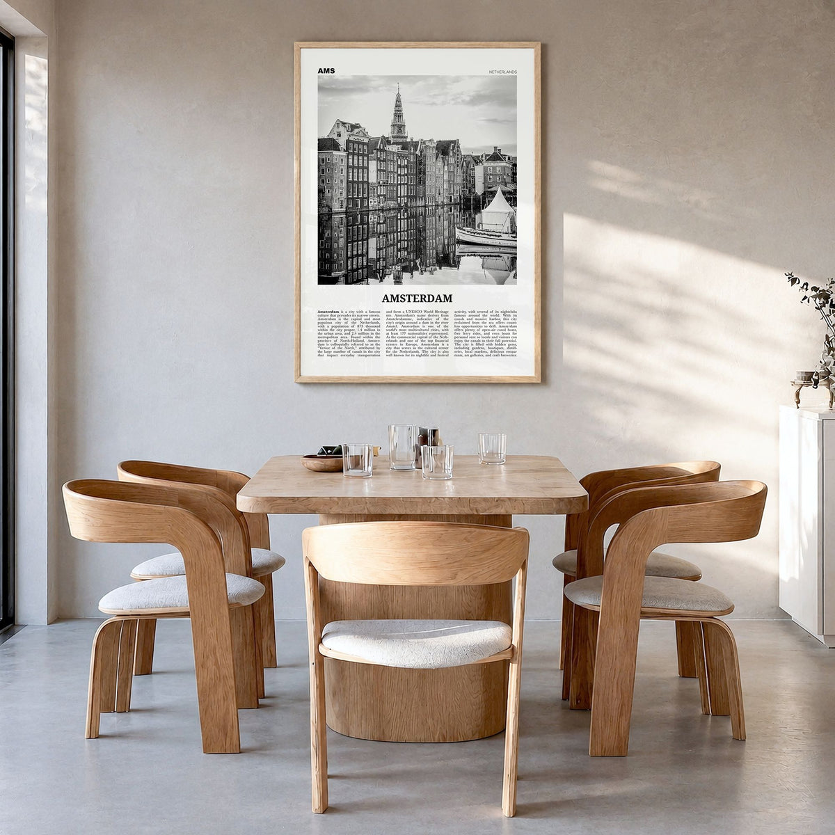 Amsterdam Newspaper No 3 Poster in a natural wood frame, hanging in a dining room
