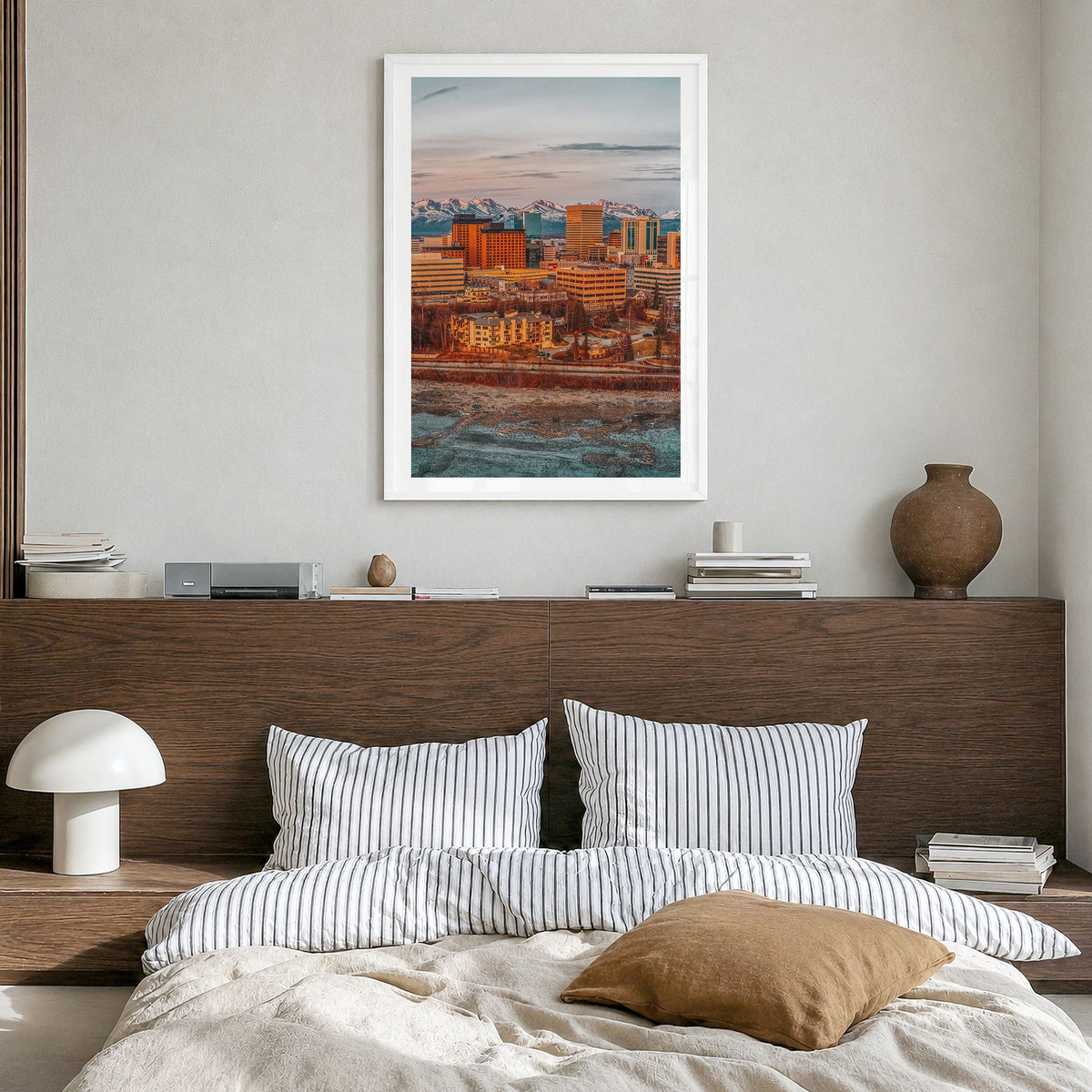 Anchorage Photo Poster in a white wood frame, hanging in a bedroom, white border