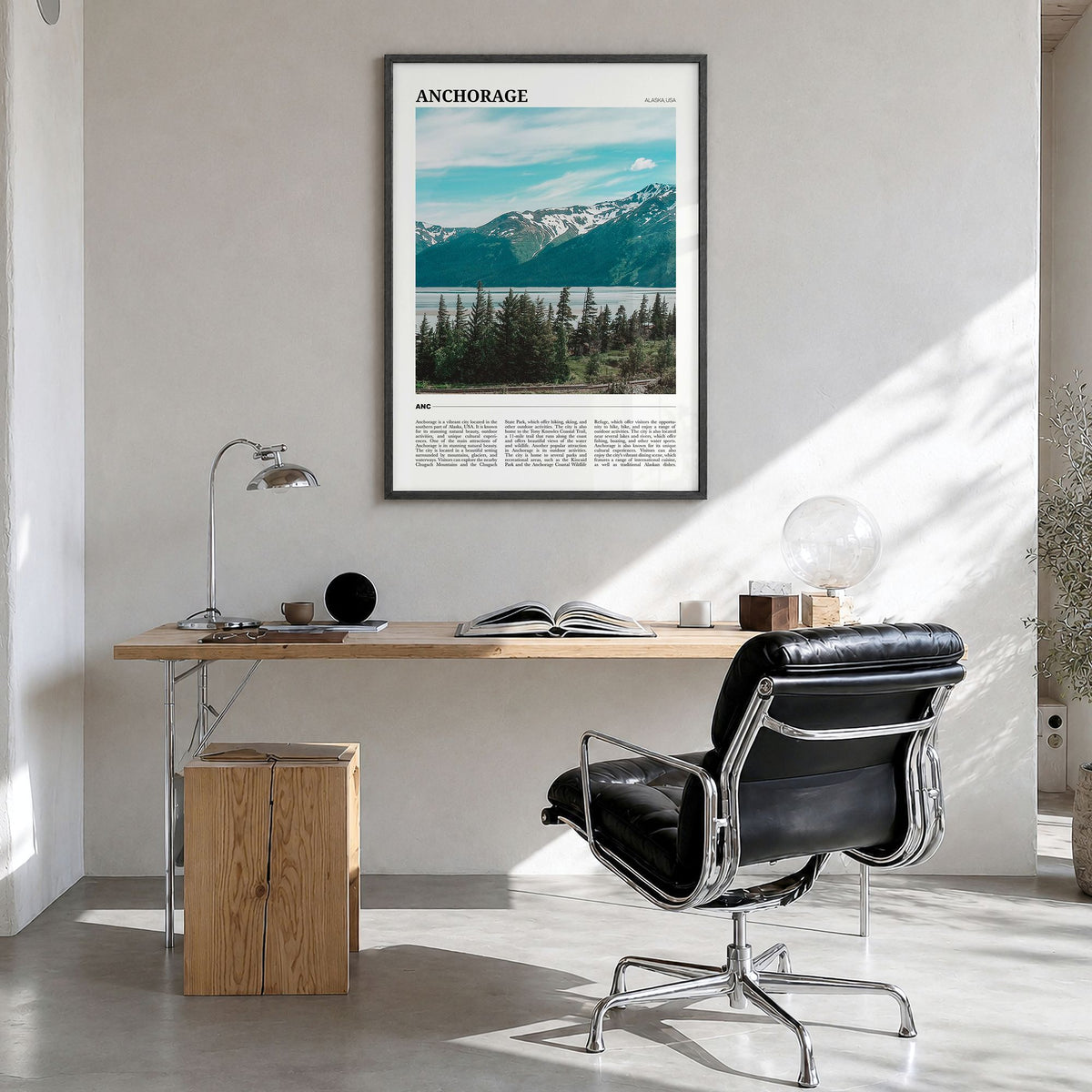 Anchorage Travel Poster in a black wood frame, hanging in a bright home office