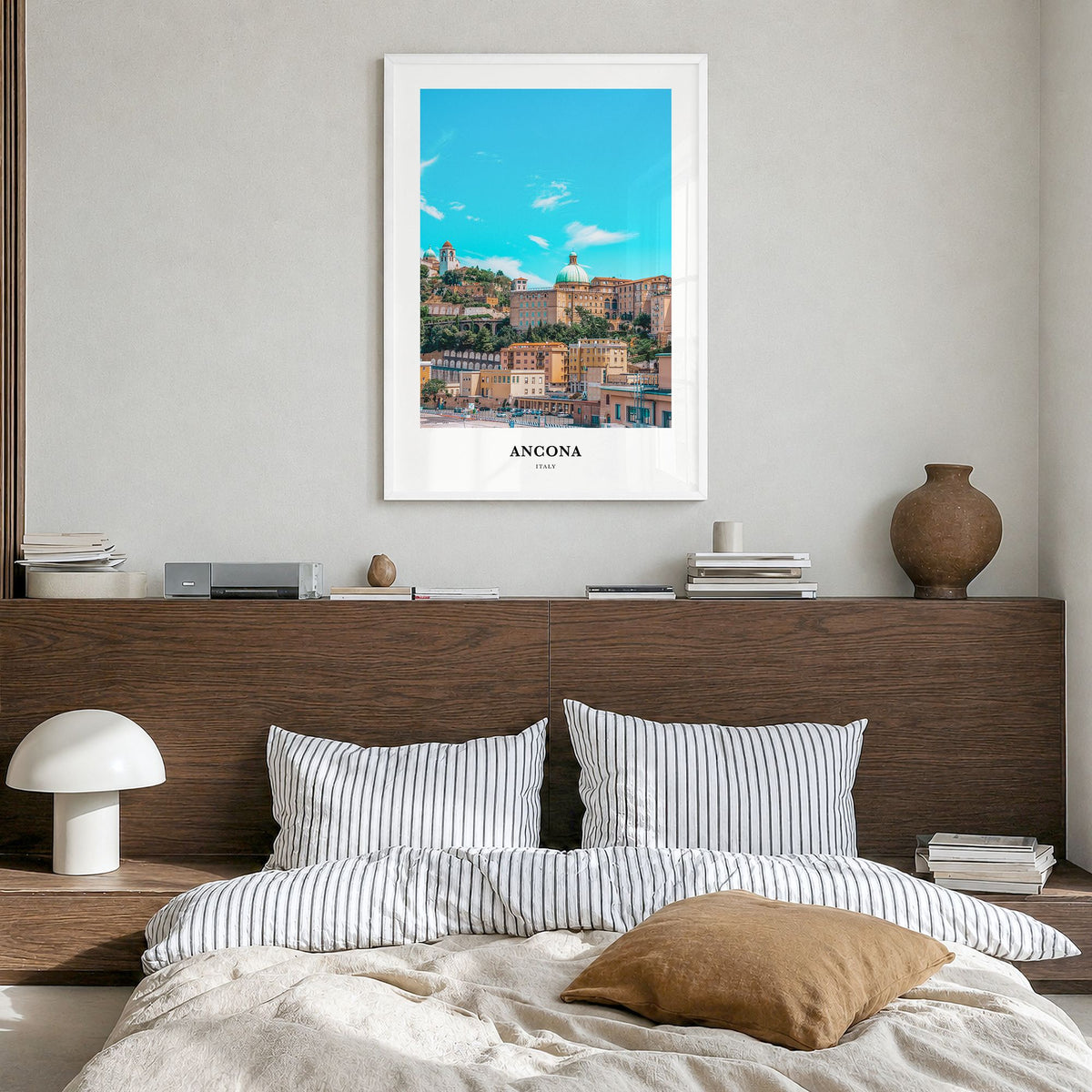 Ancona Classic Poster in a white wood frame, hanging in a bedroom