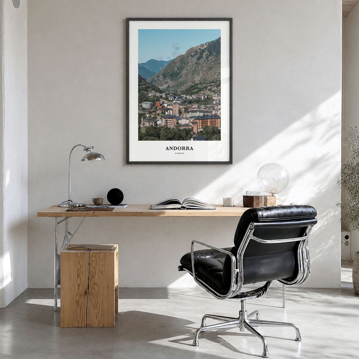 Andorra Classic Poster in a black wood frame, hanging in a bright home office