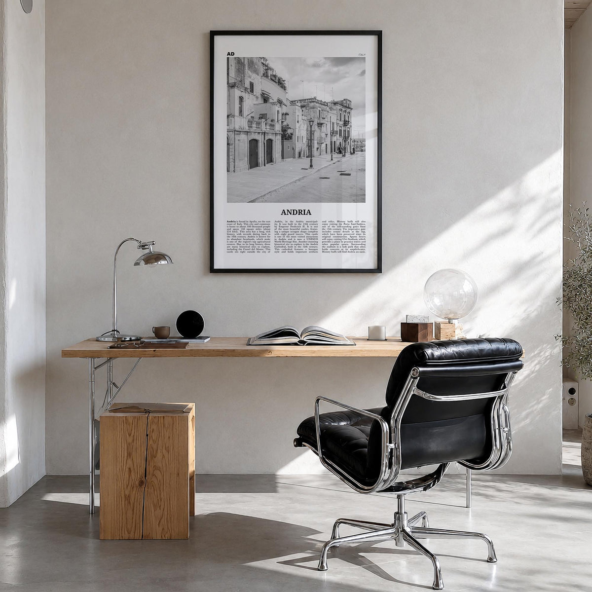 Andria black & white newspaper poster of Italy – vertical wall art in black wood frame, hanging on wall