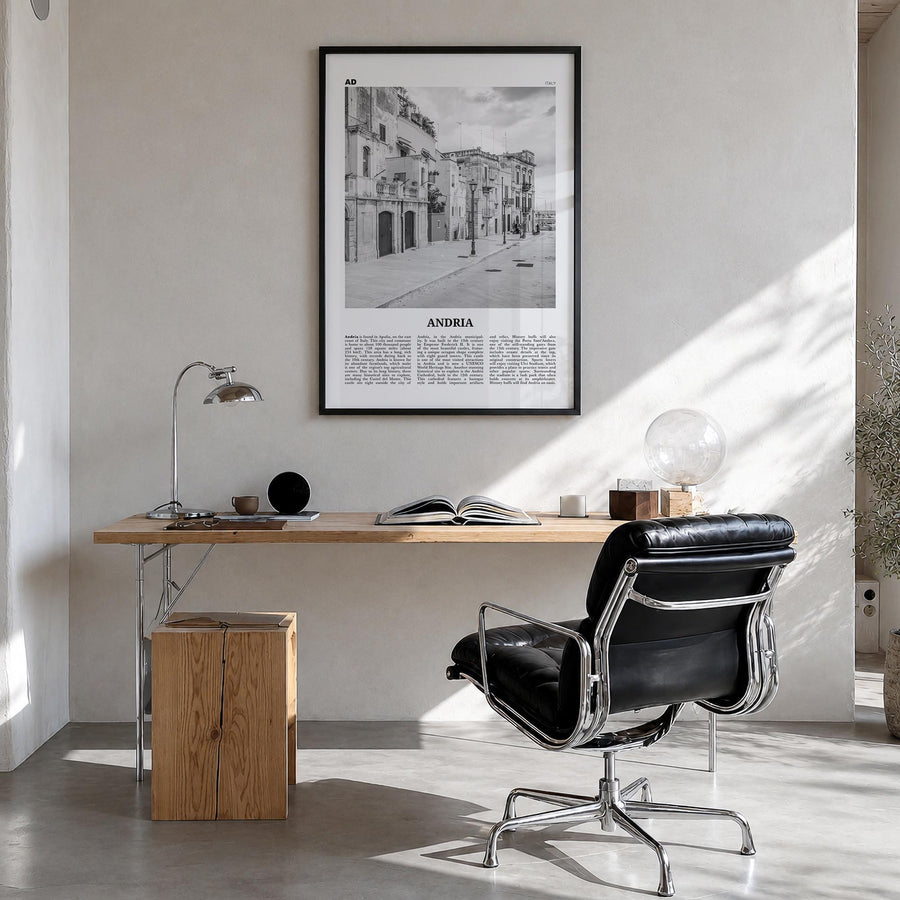 Andria black & white newspaper poster of Italy – vertical wall art in black wood frame, hanging on wall