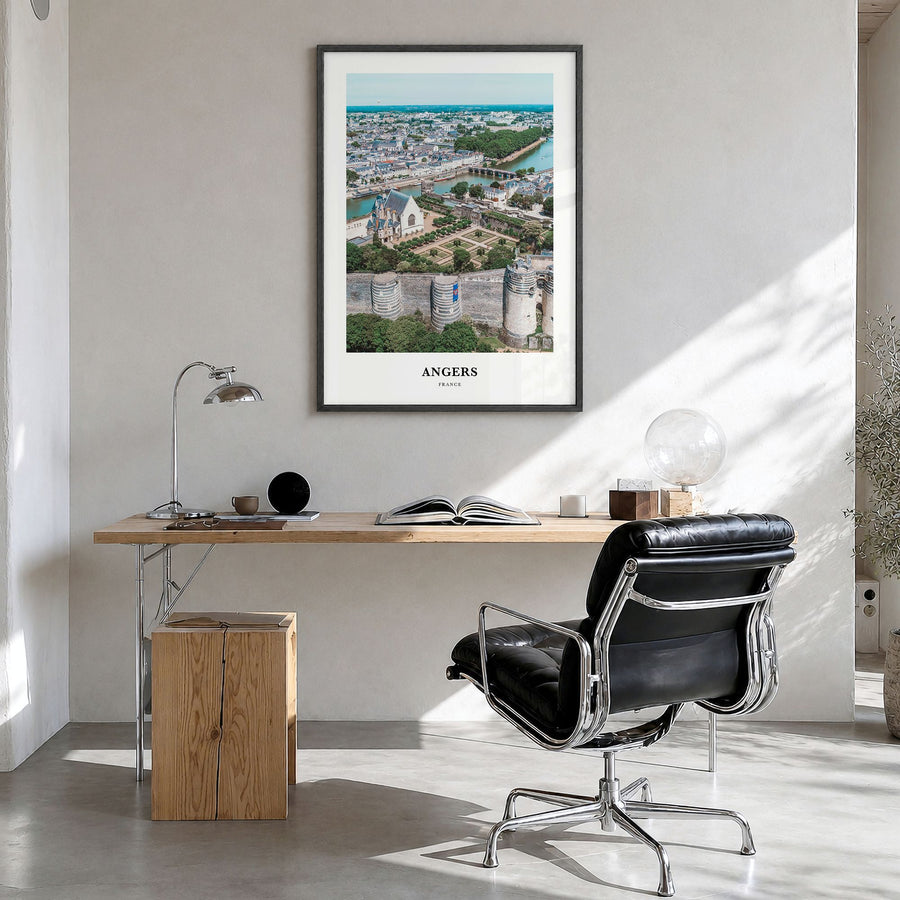 Angers Classic Poster in a black wood frame, hanging in a bright home office