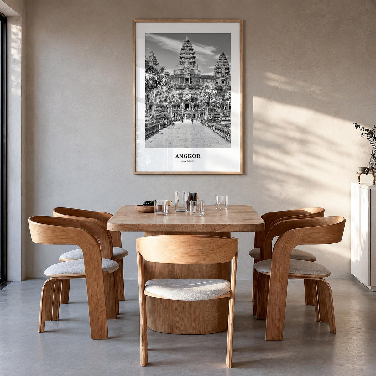 Angkor black & white classic poster of Cambodia – vertical wall art in natural wood frame, hanging on wall