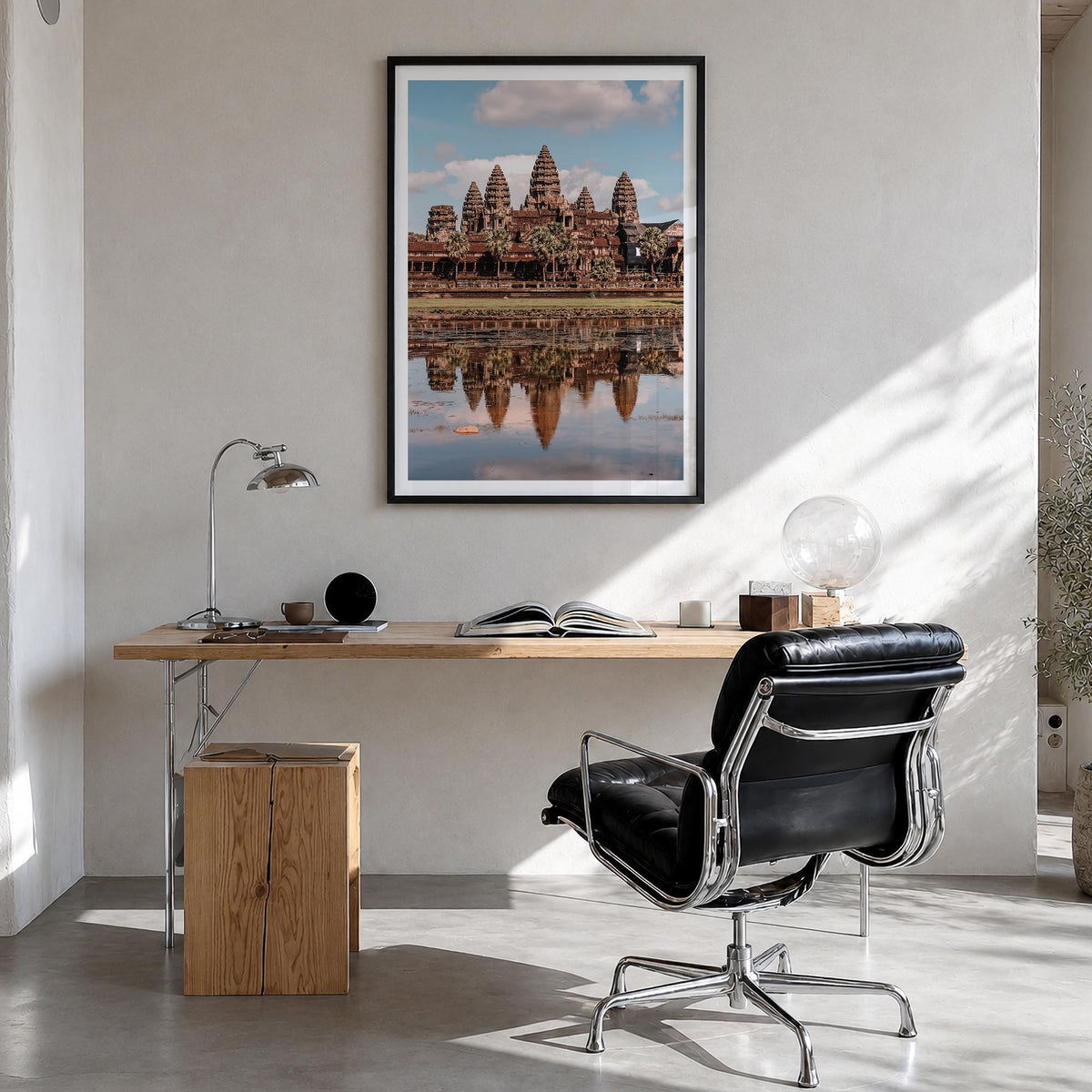 Angkor colorful photo poster of Cambodia – vertical wall art in black wood frame with white border, hanging on wall