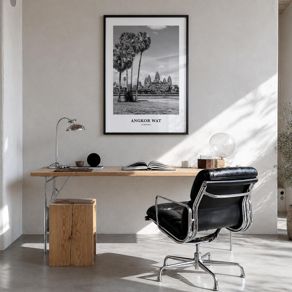 Angkor Wat black & white classic poster of Cambodia – vertical wall art in black wood frame, hanging on wall