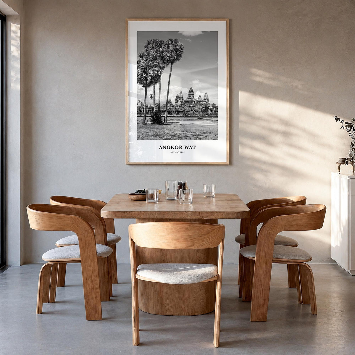 Angkor Wat black & white classic poster of Cambodia – vertical wall art in natural wood frame, hanging on wall