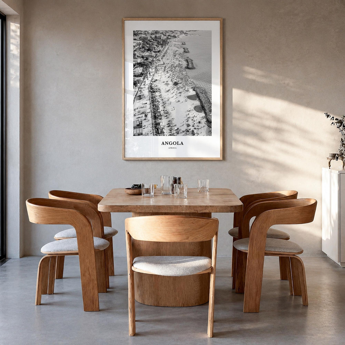 Angola black & white classic poster of Africa – vertical wall art in natural wood frame, hanging on wall