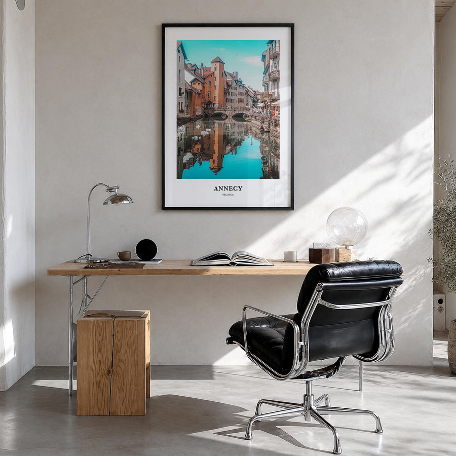 Annecy colorful classic poster of France – vertical wall art in black wood frame, hanging on wall