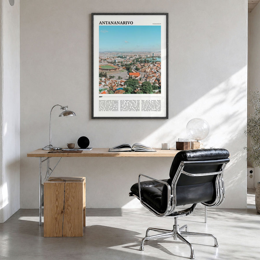Antananarivo Travel Poster in a black wood frame, hanging in a bright home office