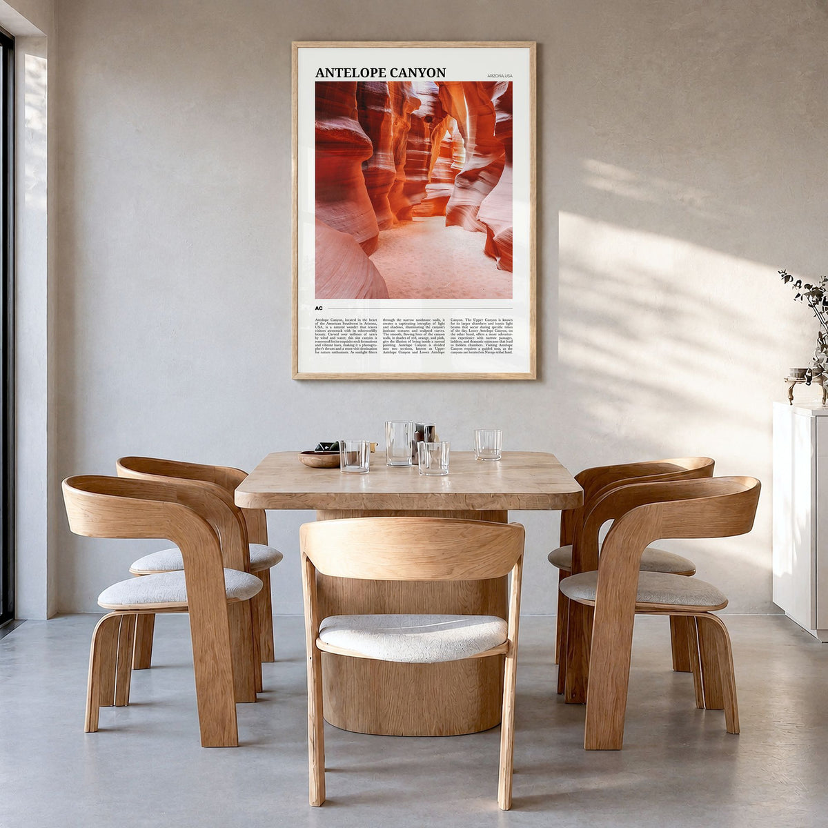 Antelope Canyon Travel Poster in a natural wood frame, hanging in a dining room