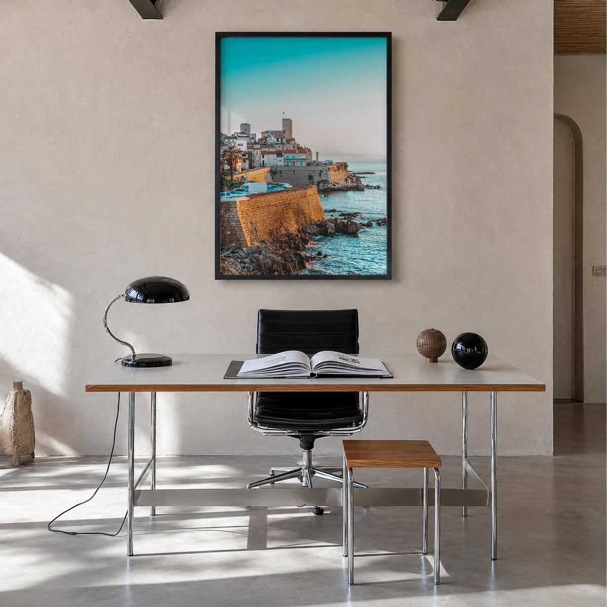 Antibes colorful photo poster of France – vertical wall art in black wood frame, hanging on wall