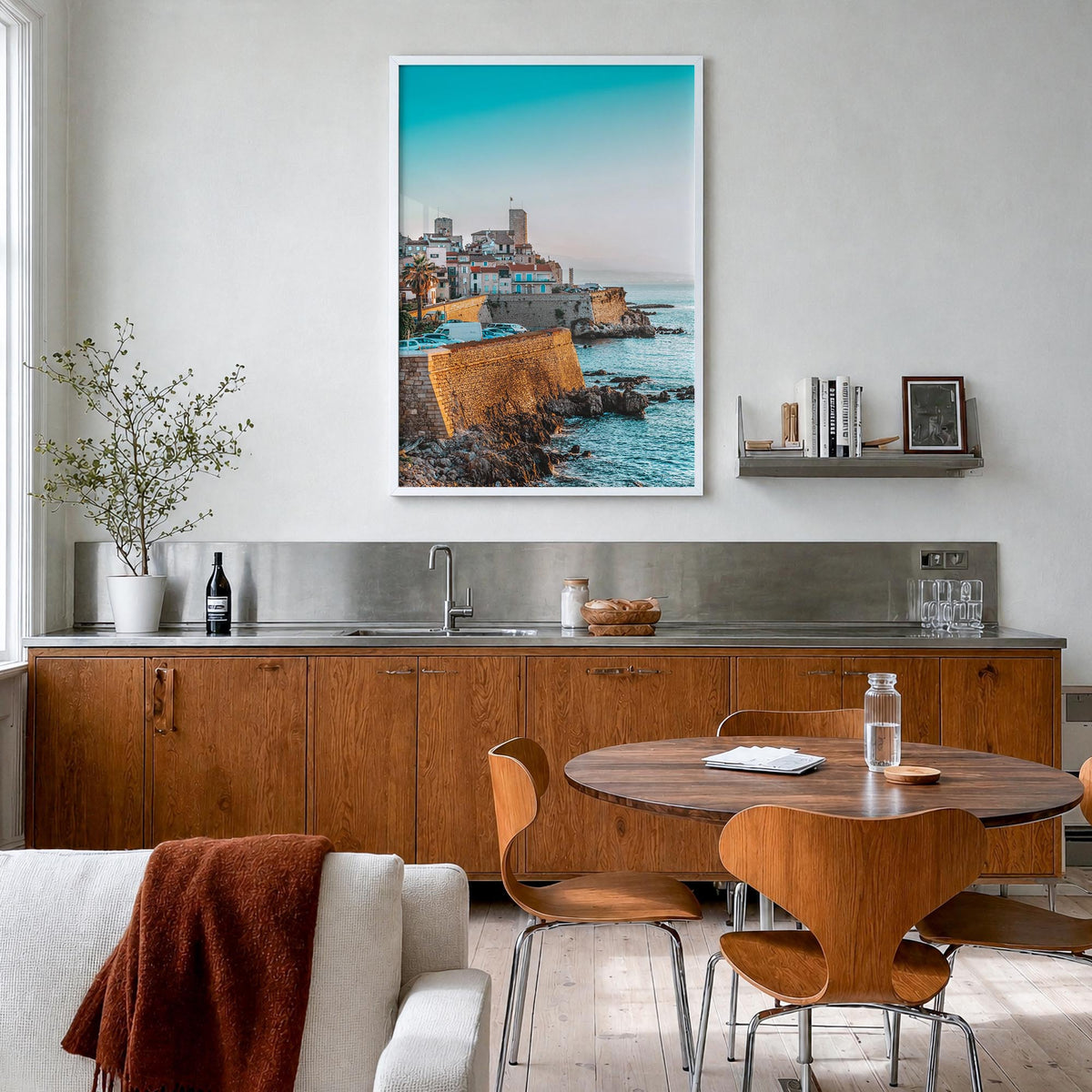Antibes colorful photo poster of France – vertical wall art in white wood frame, hanging on wall