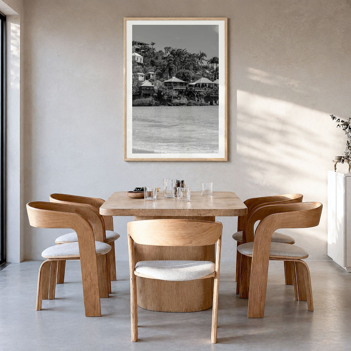 Antigua and Barbuda Photo Poster in a natural wood frame, hanging in a dining room, white border