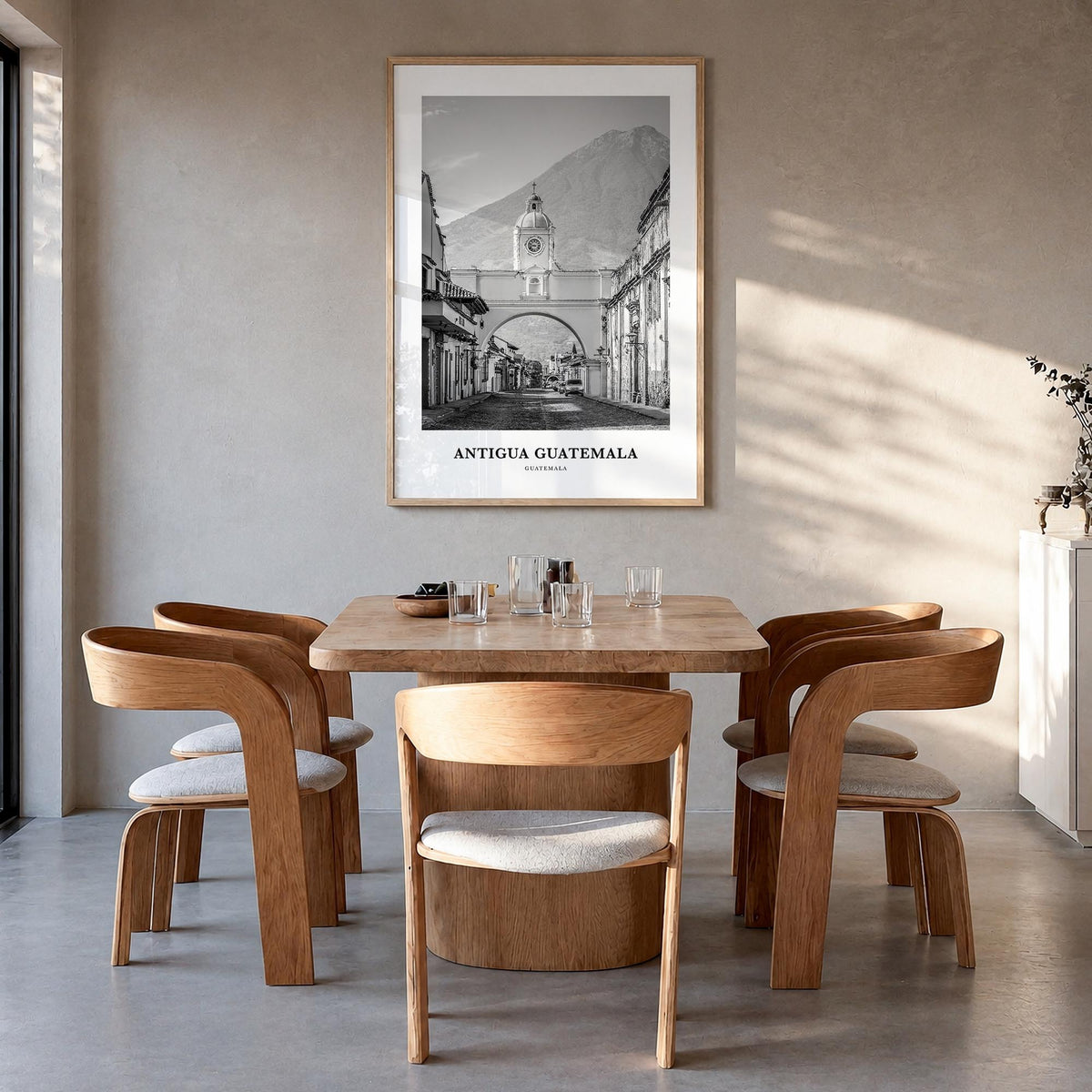 Antigua Guatemala black & white classic poster of Guatemala – vertical wall art in natural wood frame, hanging on wall