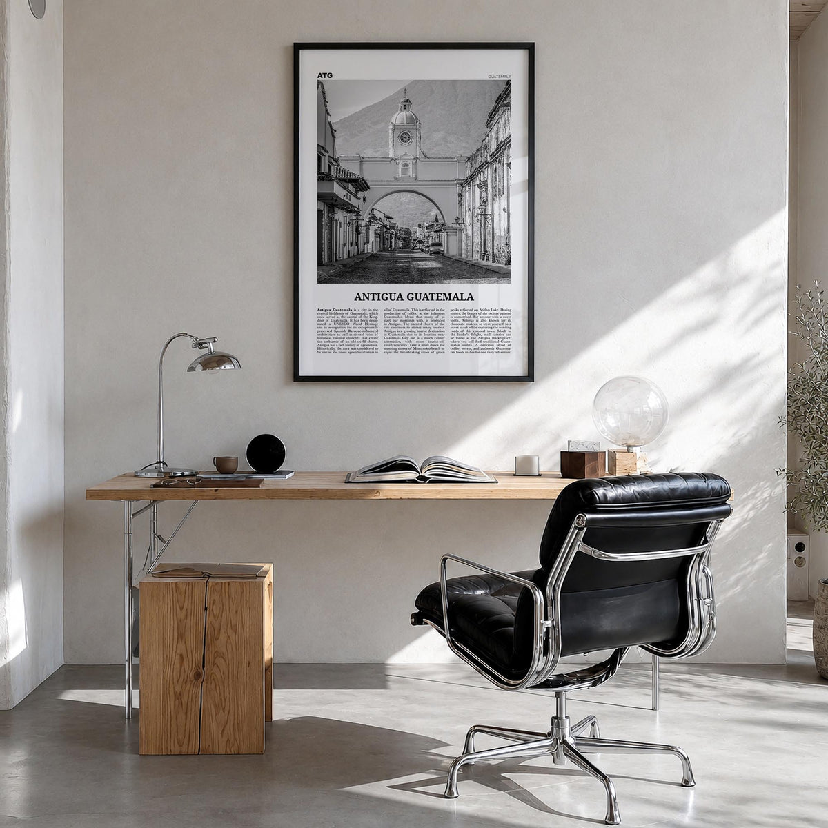 Antigua Guatemala black & white newspaper poster of Guatemala – vertical wall art in black wood frame, hanging on wall