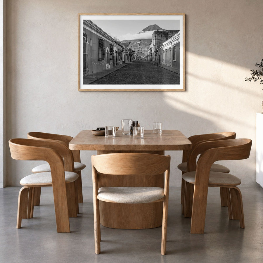 Antigua Guatemala Photo Poster in a natural wood frame, hanging in a dining room, white border