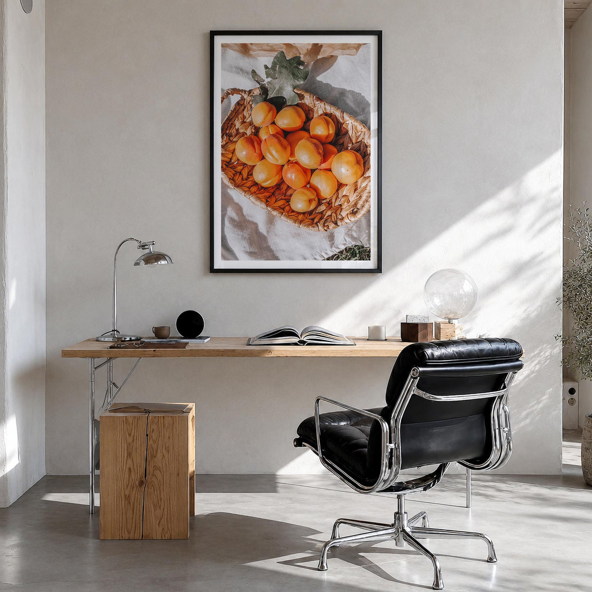Apricots colorful photo poster – vertical wall art in black wood frame with white border, hanging on wall