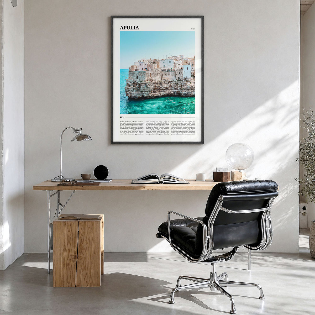 Apulia Travel Poster in a black wood frame, hanging in a bright home office