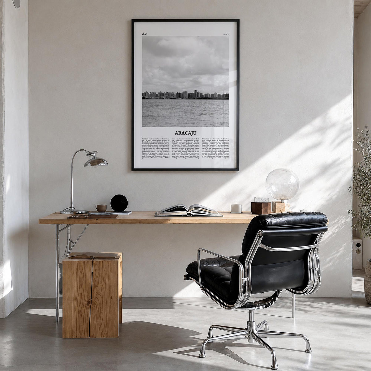 Aracaju black & white newspaper poster of Brazil – vertical wall art in black wood frame, hanging on wall