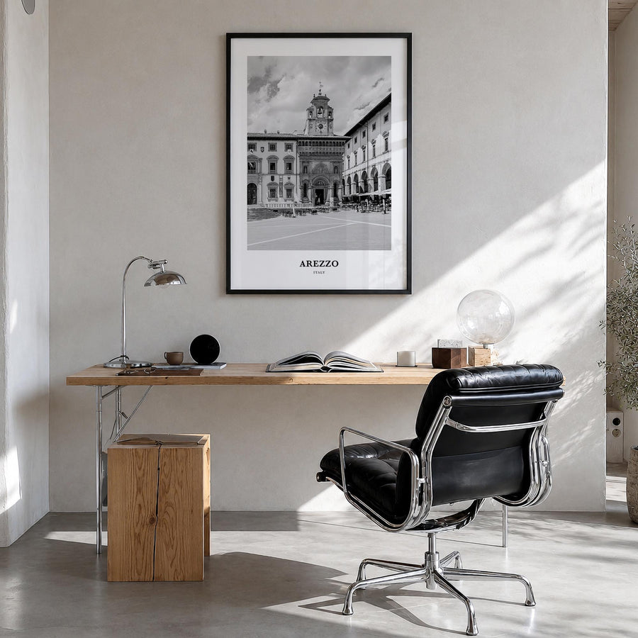 Arezzo black & white classic poster of Italy – vertical wall art in black wood frame, hanging on wall