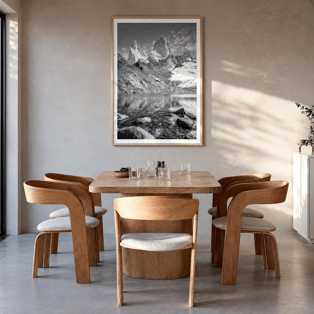 Argentina black & white photo poster of South America – vertical wall art in natural wood frame with white border, hanging on