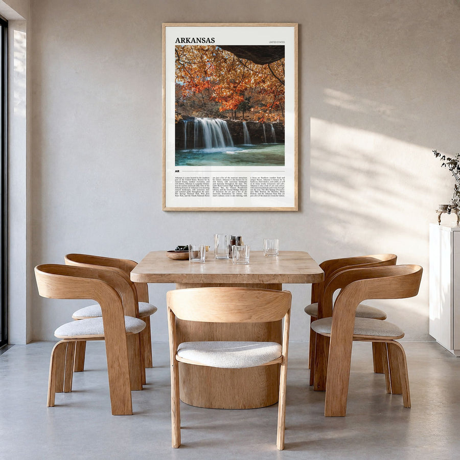 Arkansas Travel Poster in a natural wood frame, hanging in a dining room