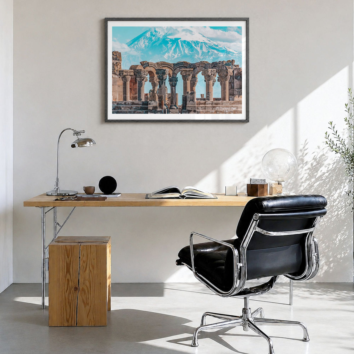 Armenia Photo Poster in a black wood frame, hanging in a bright home office, white border
