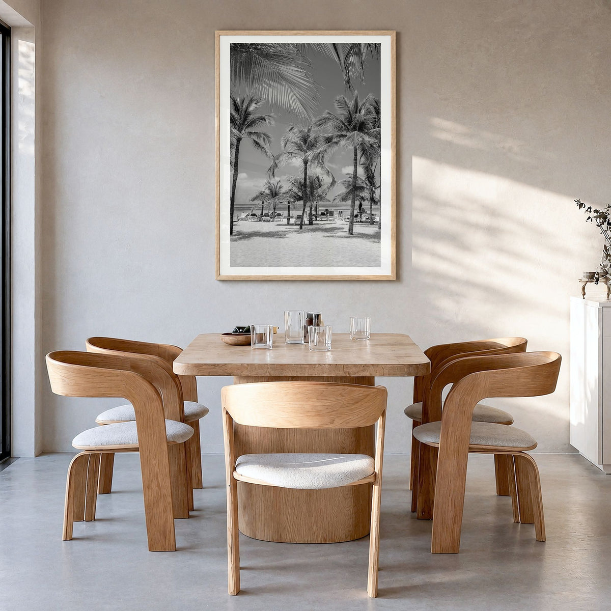 Aruba Photo Poster in a natural wood frame, hanging in a dining room, white border