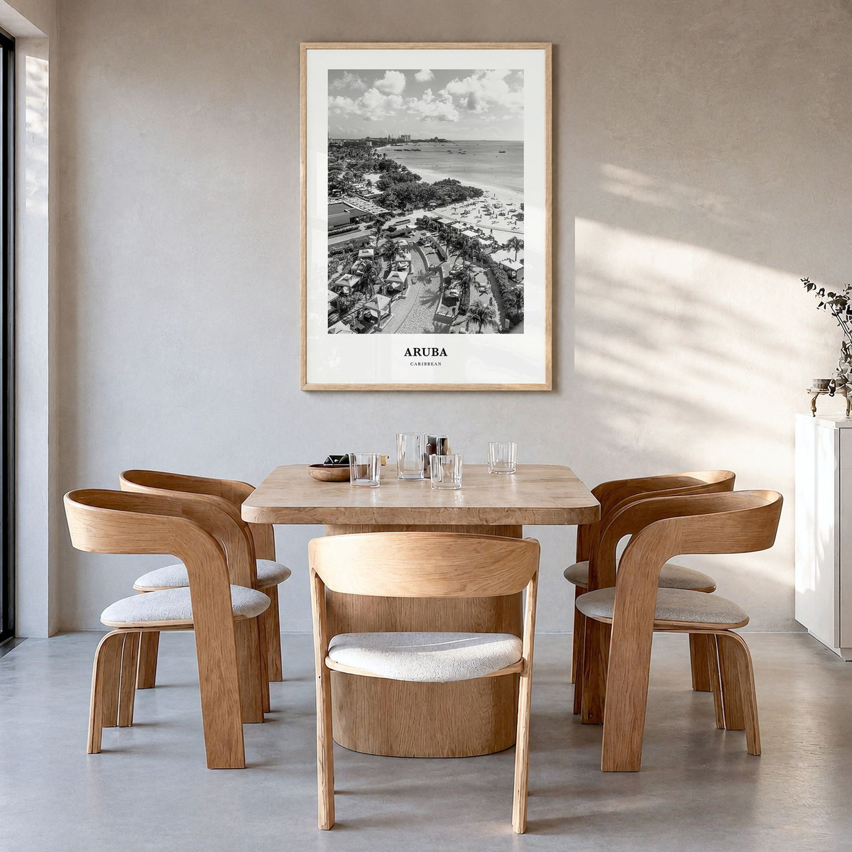 Aruba Classic No 2 Poster in a natural wood frame, hanging in a dining room