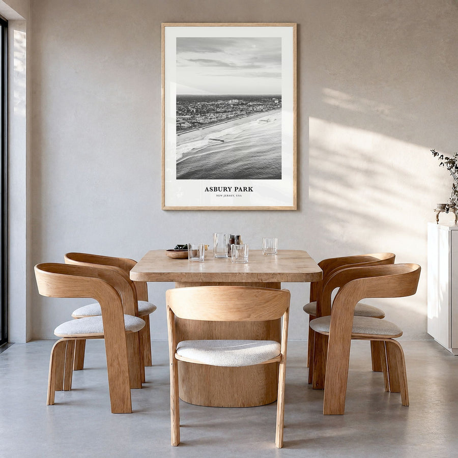 Asbury Park Classic Poster in a natural wood frame, hanging in a dining room