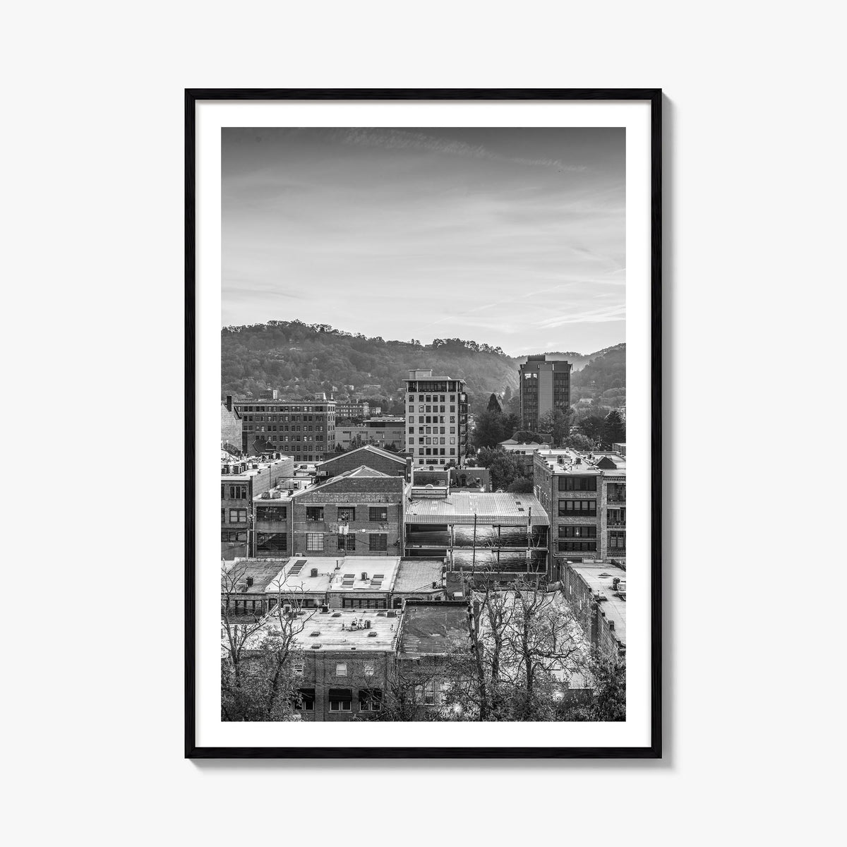 Asheville black & white photo poster of North Carolina, USA – vertical wall art, unframed print shown in interior mockup
